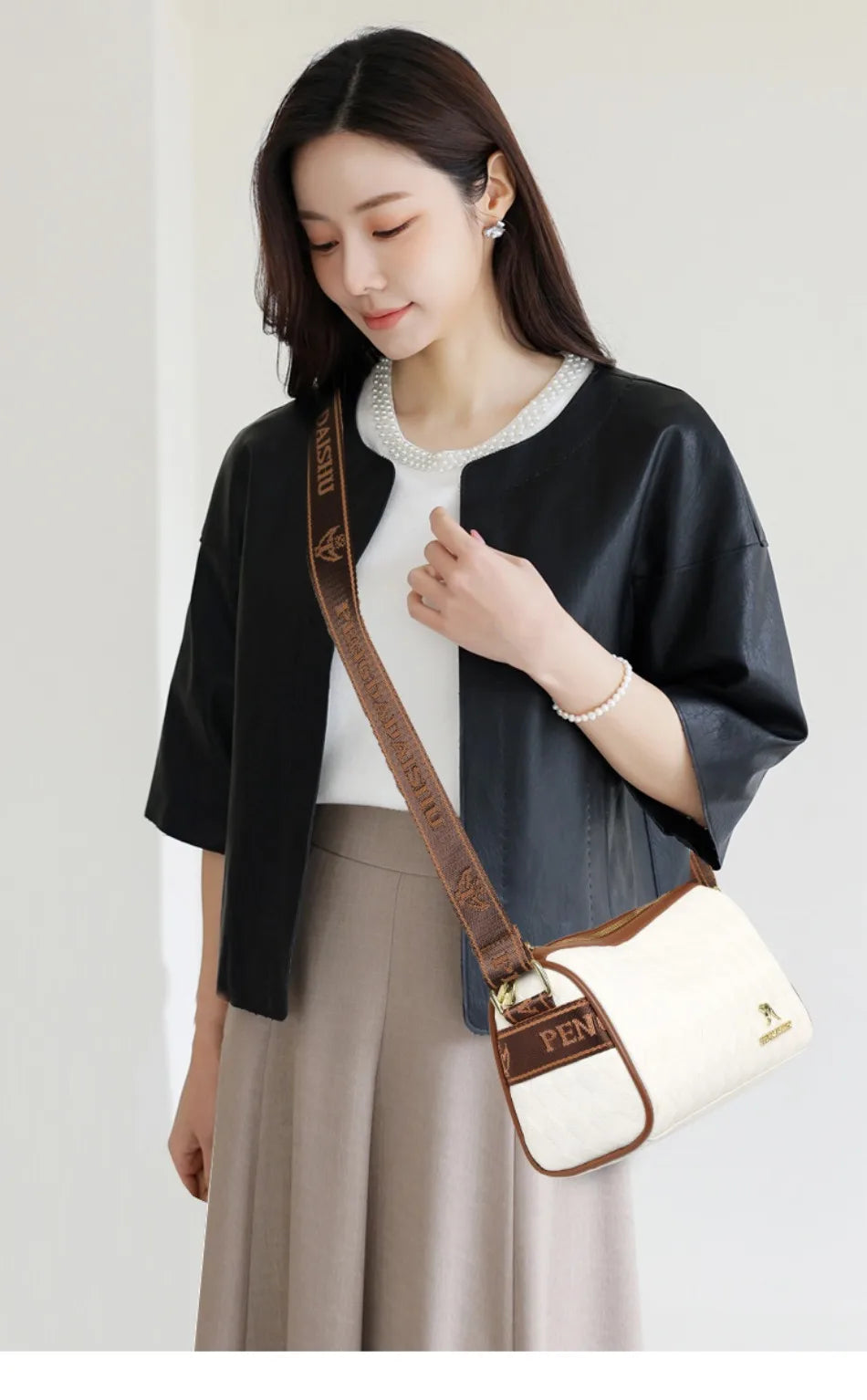 Sac à main en cuir, porté épaule et croisé